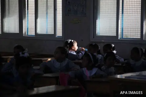Palestinian students return back to their schools "UNRWA" in the morning of the first day of the new year study in Gaza city on Sep. 02, 2012. The academic year began in the Gaza Strip and West Bank on Sept. 02. Photo by...