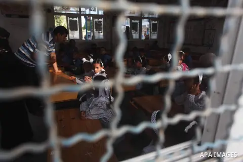 Palestinian students return back to their schools "UNRWA" in the morning of the first day of the new year study in Gaza city on Sep. 02, 2012. The academic year began in the Gaza Strip and West Bank on Sept. 02. Photo by...