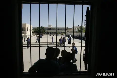 Palestinian students return back to their schools in the morning of the first day of the new year study in Rafah in the southern Gaza Strip. 02, 2012. The academic year began in the Gaza Strip and West Bank on Sept. 02....