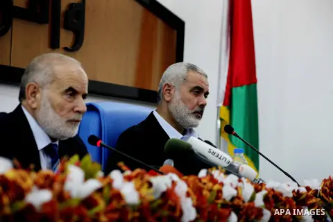 Ismail Haniya, the head of the Hamas government in the Gaza Strip, chairs a meeting members of the Palestinian Legislative Council in Gaza City on September 2, 2012. Haniya, announced a cabinet reshuffle, appointing seve...