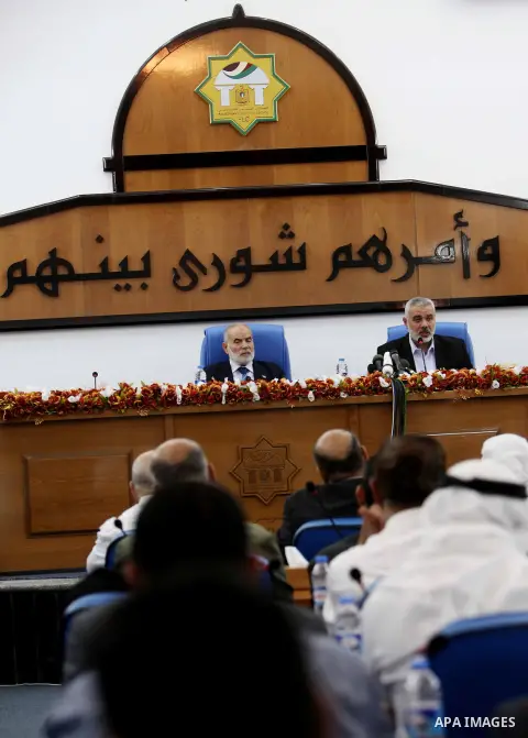 Ismail Haniya, the head of the Hamas government in the Gaza Strip, chairs a meeting members of the Palestinian Legislative Council in Gaza City on September 2, 2012. Haniya, announced a cabinet reshuffle, appointing seve...