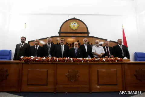 Ismail Haniya, the head of the Hamas government in the Gaza Strip, chairs a meeting members of the Palestinian Legislative Council in Gaza City on September 2, 2012. Haniya, announced a cabinet reshuffle, appointing seve...