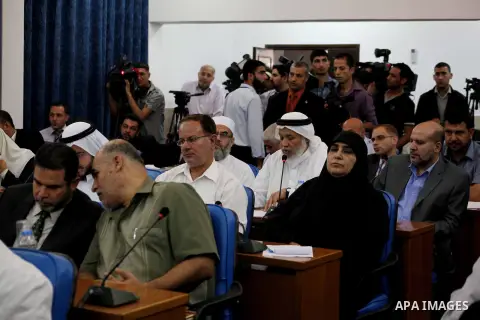 Ismail Haniya, the head of the Hamas government in the Gaza Strip, chairs a meeting members of the Palestinian Legislative Council in Gaza City on September 2, 2012. Haniya, announced a cabinet reshuffle, appointing seve...