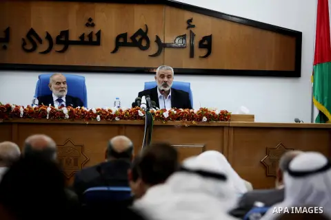 Ismail Haniya, the head of the Hamas government in the Gaza Strip, chairs a meeting members of the Palestinian Legislative Council in Gaza City on September 2, 2012. Haniya, announced a cabinet reshuffle, appointing seve...