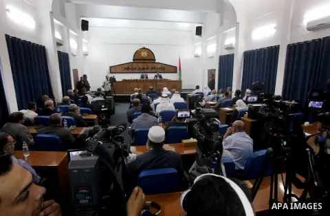 Ismail Haniya, the head of the Hamas government in the Gaza Strip, chairs a meeting members of the Palestinian Legislative Council in Gaza City on September 2, 2012. Haniya, announced a cabinet reshuffle, appointing seve...