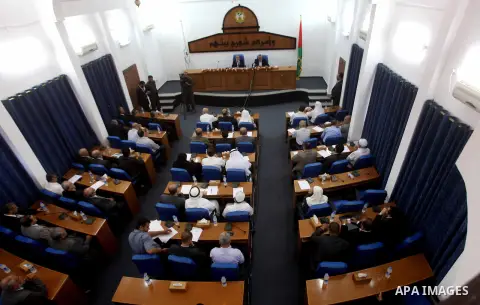 Ismail Haniya, the head of the Hamas government in the Gaza Strip, chairs a meeting members of the Palestinian Legislative Council in Gaza City on September 2, 2012. Haniya, announced a cabinet reshuffle, appointing seve...