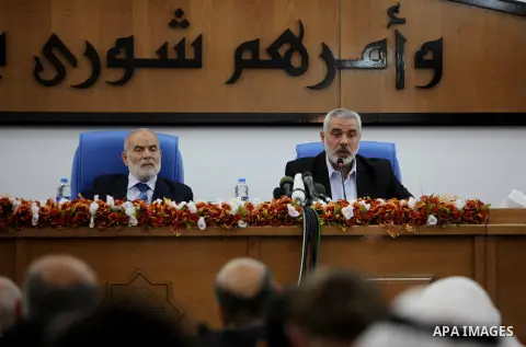 Ismail Haniya, the head of the Hamas government in the Gaza Strip, chairs a meeting members of the Palestinian Legislative Council in Gaza City on September 2, 2012. Haniya, announced a cabinet reshuffle, appointing seve...