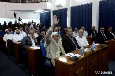 Ismail Haniya, the head of the Hamas government in the Gaza Strip, chairs a meeting members of the Palestinian Legislative Council in Gaza City on September 2, 2012. Haniya, announced a cabinet reshuffle, appointing seve...