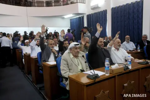 Ismail Haniya, the head of the Hamas government in the Gaza Strip, chairs a meeting members of the Palestinian Legislative Council in Gaza City on September 2, 2012. Haniya, announced a cabinet reshuffle, appointing seve...