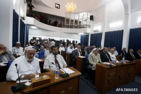 Ismail Haniya, the head of the Hamas government in the Gaza Strip, chairs a meeting members of the Palestinian Legislative Council in Gaza City on September 2, 2012. Haniya, announced a cabinet reshuffle, appointing seve...
