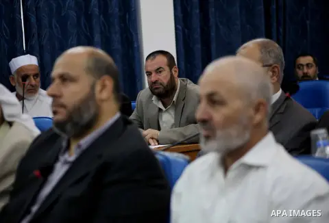 Ismail Haniya, the head of the Hamas government in the Gaza Strip, chairs a meeting members of the Palestinian Legislative Council in Gaza City on September 2, 2012. Haniya, announced a cabinet reshuffle, appointing seve...