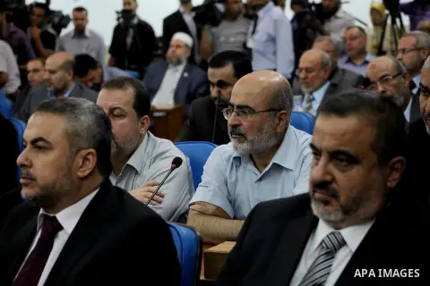 Ismail Haniya, the head of the Hamas government in the Gaza Strip, chairs a meeting members of the Palestinian Legislative Council in Gaza City on September 2, 2012. Haniya, announced a cabinet reshuffle, appointing seve...