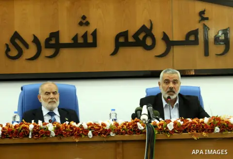 Ismail Haniya, the head of the Hamas government in the Gaza Strip, chairs a meeting members of the Palestinian Legislative Council in Gaza City on September 2, 2012. Haniya, announced a cabinet reshuffle, appointing seve...