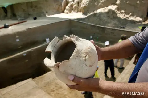 Palestinian workers do excavation in a new discovered archeological site dating back to the Iron-Age period in Rafah, southern Gaza Strip, on Aug. 30, 2012. Photo by Eyad Al Baba