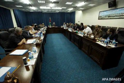 Ismail Haniya, the head of the Hamas government in the Gaza Strip, speaks during the first meeting of the Government in Gaza City on September 4, 2012. Haniya, announced a cabinet reshuffle, appointing seven new minister...