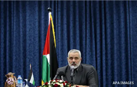 Ismail Haniya, the head of the Hamas government in the Gaza Strip, speaks during the first meeting of the Government in Gaza City on September 4, 2012. Haniya, announced a cabinet reshuffle, appointing seven new minister...