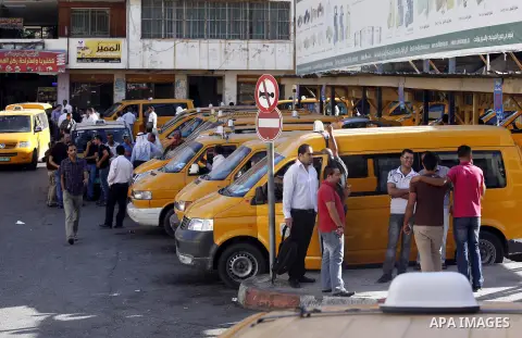 Palestinian taxi drivers park their cars during a protest against rising fuel prices and the high cost of living, in the West Bank city of Nablus, Wednesday Sept. 6, 2012. Photo by Nedal Eshtayah