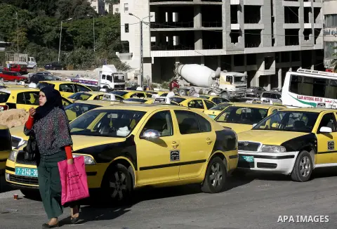 Palestinian taxi drivers park their cars during a protest against rising fuel prices and the high cost of living, in the West Bank city of Nablus, Wednesday Sept. 6, 2012. Photo by Nedal Eshtayah