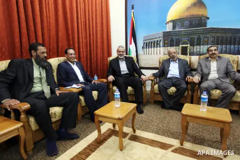 Ismail Haniya, the head of the Hamas government in the Gaza Strip, receives The delegation of the Arab front to participate in the Palestinian resistance in Gaza City on September 6, 2012. Photo by Ahmed Shaat