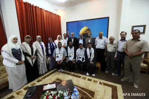 Ismail Haniya, the head of the Hamas government in the Gaza Strip, receives The delegation of the Arab front to participate in the Palestinian resistance in Gaza City on September 6, 2012. Photo by Ahmed Shaat