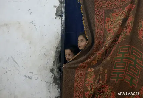 Palestinian girls play in front of their house in Rafah refugee camp in the southern of Gaza Strip, on September 08. 2012 Photo by Eyad Al Baba