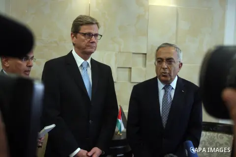 Palestinian Prime Minister Salam Fayyad (R) meets with Germany's Foreign Minister Guido Westerwelle in the West Bank city of Ramallah September 9, 2012. Westerwelle urged Iran on Sunday to bring "substantial offers" to a...