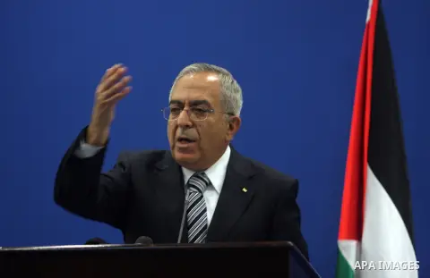 Palestinian Prime Minister Salam Fayyad addresses the media during a news conference in the West Bank city of Ramallah September 11, 2012. Demonstrations against the rising cost of living turned violent in the cities of...
