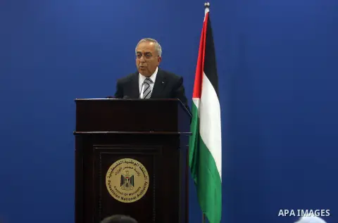 Palestinian Prime Minister Salam Fayyad addresses the media during a news conference in the West Bank city of Ramallah September 11, 2012. Demonstrations against the rising cost of living turned violent in the cities of...