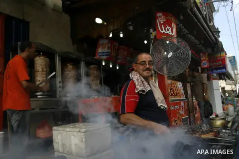 Palestinian vendors sell shawarma at Al Hana restaurant in Rafah in the southern Gaza Strip, on Sep. 12, 2012. Photo by Eyad Al Baba
