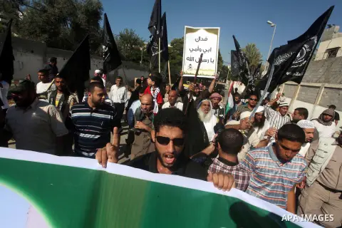 Palestinians chant during protest in front of the United Nations headquarters in Gaza city against the showing of a movie that is allegedly offensive to Muslim Prophet Mohammad, Sept 12, 2012. Photo by Ashraf Amra