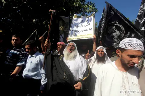 Palestinians chant during protest in front of the United Nations headquarters in Gaza city against the showing of a movie that is allegedly offensive to Muslim Prophet Mohammad, Sept 12, 2012. Photo by Ashraf Amra
