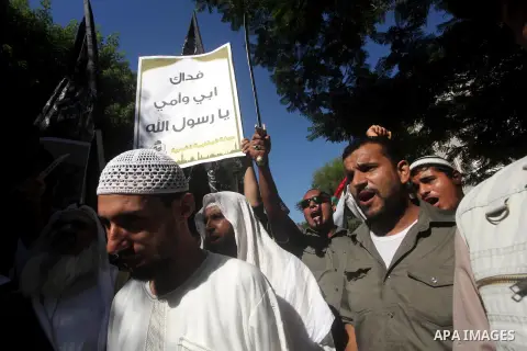 Palestinians chant during protest in front of the United Nations headquarters in Gaza city against the showing of a movie that is allegedly offensive to Muslim Prophet Mohammad, Sept 12, 2012. Photo by Ashraf Amra