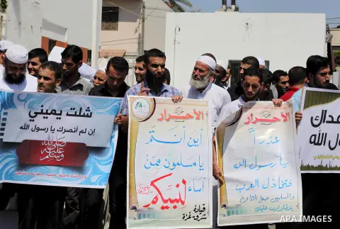 Palestinians protest against the movie, "Innocence of Muslims," in front of the Legislative Council in Gaza City, Sept. 13, 2012. Muslim anger over perceived Western insults to Islam has exploded several times, most rece...