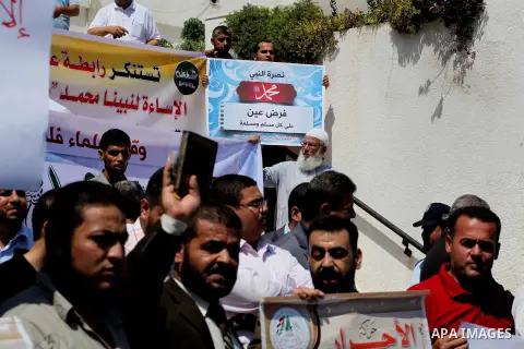 Palestinians protest against the movie, "Innocence of Muslims," in front of the Legislative Council in Gaza City, Sept. 13, 2012. Muslim anger over perceived Western insults to Islam has exploded several times, most rece...