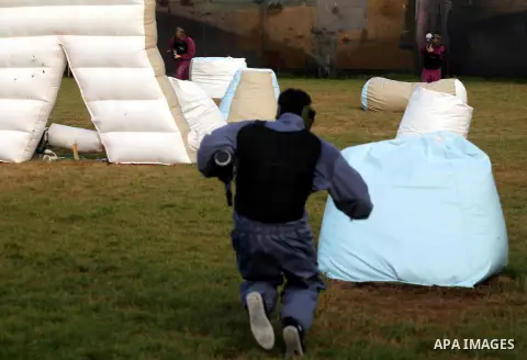 Palestinian youths play paintball at Si Lamy park southern Gaza Strip on Sept 13, 2012. Photo by Majdi Fathi