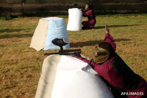 Palestinian youths play paintball at Si Lamy park southern Gaza Strip on Sept 13, 2012. Photo by Majdi Fathi