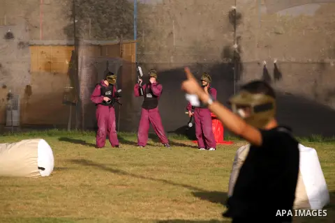 Palestinian youths play paintball at Si Lamy park southern Gaza Strip on Sept 13, 2012. Photo by Majdi Fathi