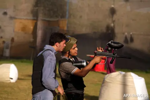 Palestinian youths play paintball at Si Lamy park southern Gaza Strip on Sept 13, 2012. Photo by Majdi Fathi