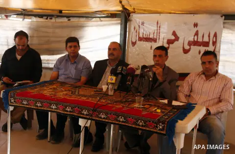 Palestinians attend a press conference against the confiscation of Palestinian lands and demolition their houses in the mostly Arab neighbourhood of Silwan in Jerusalem on Sept 13, 2012. Photo by Mahfouz Abu Turk