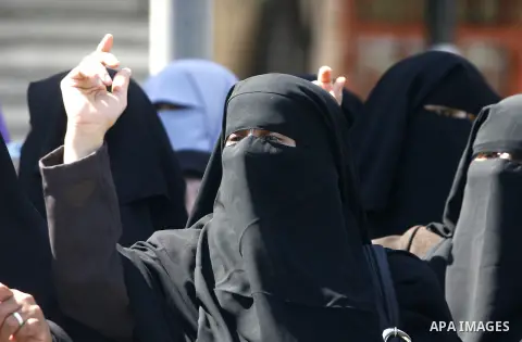Palestinian women shout anti-US slogans during a demonstration against the controversial film 'Innocence of Muslims' in Rafah southern Gaza strip, on September 14, 2012. The controversial low budget film reportedly made...