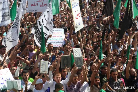 Palestinians shout anti-U.S. slogans during a demonstration against the controversial film 'Innocence of Muslims' in Gaza City, on September 14, 2012. The controversial low budget film reportedly made by an Israeli-Ameri...