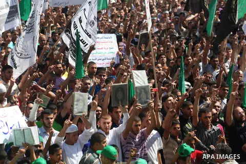 Palestinians shout anti-U.S. slogans during a demonstration against the controversial film 'Innocence of Muslims' in Gaza City, on September 14, 2012. The controversial low budget film reportedly made by an Israeli-Ameri...