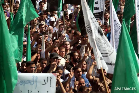 Palestinians shout anti-U.S. slogans during a demonstration against the controversial film 'Innocence of Muslims' in Gaza City, on September 14, 2012. The controversial low budget film reportedly made by an Israeli-Ameri...