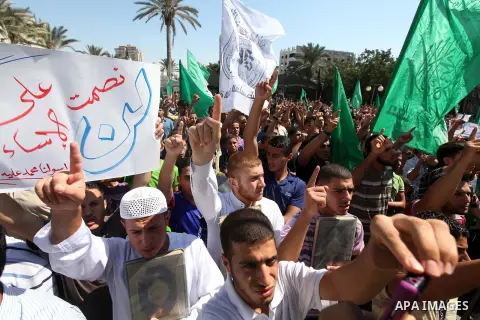 Palestinians shout anti-U.S. slogans during a demonstration against the controversial film 'Innocence of Muslims' in Gaza City, on September 14, 2012. The controversial low budget film reportedly made by an Israeli-Ameri...
