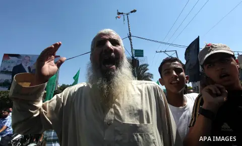Palestinians shout anti-U.S. slogans during a demonstration against the controversial film 'Innocence of Muslims' in Gaza City, on September 14, 2012. The controversial low budget film reportedly made by an Israeli-Ameri...