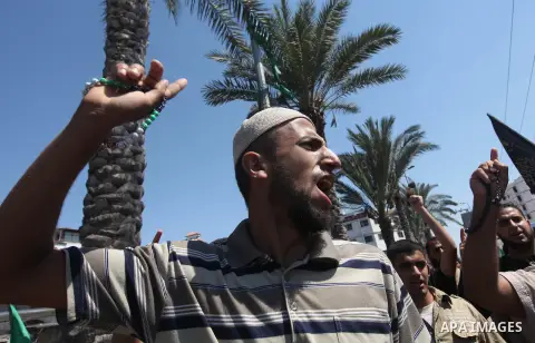 Palestinians shout anti-U.S. slogans during a demonstration against the controversial film 'Innocence of Muslims' in Gaza City, on September 14, 2012. The controversial low budget film reportedly made by an Israeli-Ameri...