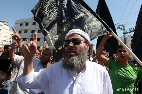 Palestinians shout anti-U.S. slogans during a demonstration against the controversial film 'Innocence of Muslims' in Gaza City, on September 14, 2012. The controversial low budget film reportedly made by an Israeli-Ameri...