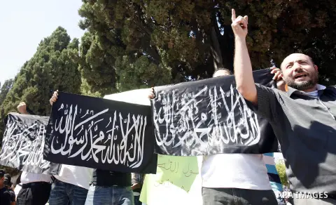 Palestinians shout slogans during a demonstration against the controversial film 'Innocence of Muslims' in front of al-Aqsa Mosqe in Jerusalem, on September 14, 2012. The controversial low budget film reportedly made by...