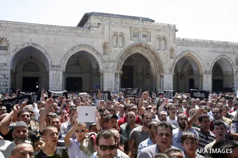Palestinians shout slogans during a demonstration against the controversial film 'Innocence of Muslims' in front of al-Aqsa Mosqe in Jerusalem, on September 14, 2012. The controversial low budget film reportedly made by...