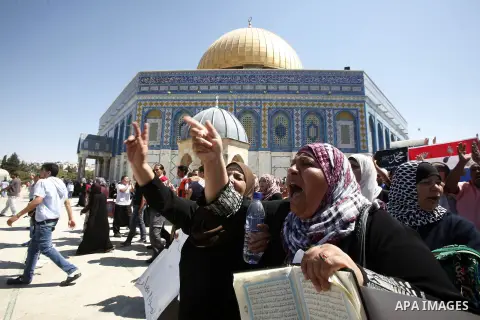 Palestinian women shout slogans during a demonstration against the controversial film 'Innocence of Muslims' in front of al-Aqsa Mosqe in Jerusalem, on September 14, 2012. The controversial low budget film reportedly mad...